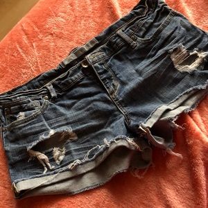 Distressed denim shorts